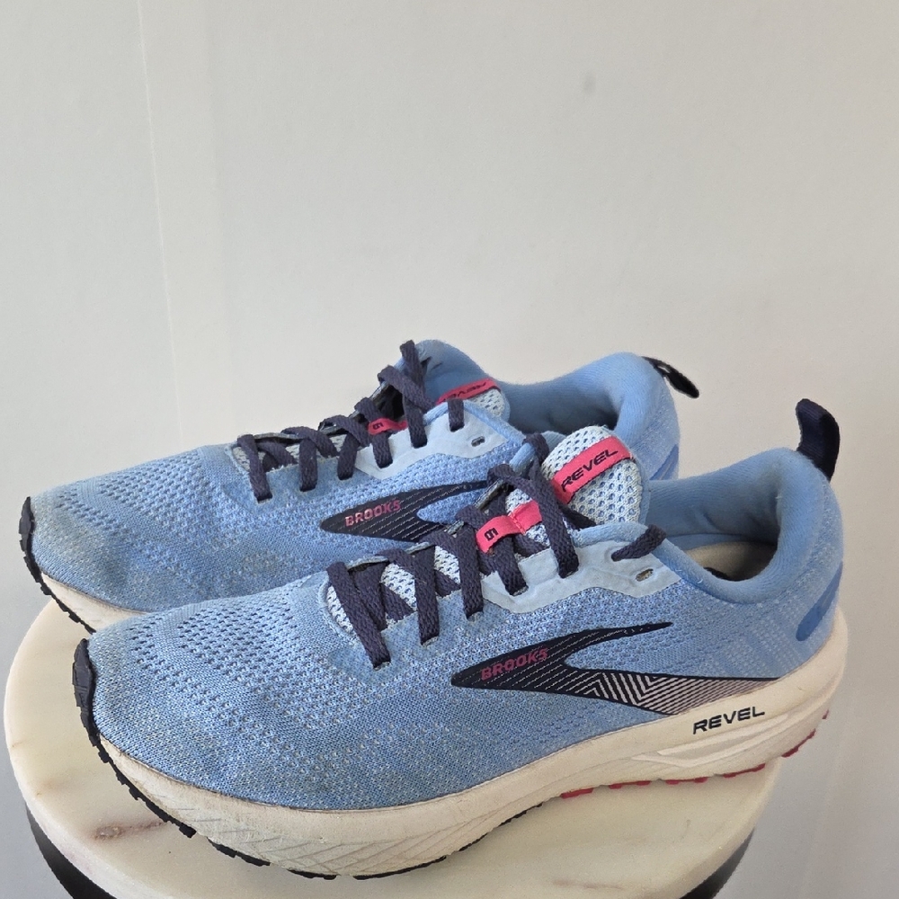Brooks light blue running shoes with navy and pink accents Size 9.5